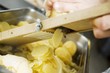 Photo: Slicer cooked potatoes with vegetable slicer Slicer cooked potatoes with vegetable slicer
