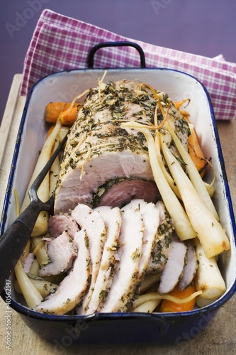 Foto: Rolled pork roast with herbs and parsley roots Rolled pork roast with herbs and parsley roots