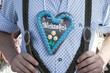 Man with Lebkuchen heart at Oktoberfest