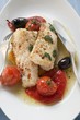 Monkfish fillets with cherry tomatoes and olives