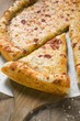 American-style pizza Margherita with piece on server