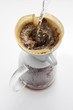 Making filter coffee (pouring hot water onto coffee)