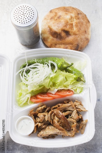 Photo: Döner kebab with salad in lunch box Döner kebab with salad in lunch box