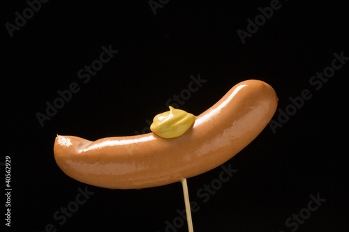 Photo: Frankfurter with mustard on cocktail stick Frankfurter with mustard on cocktail stick