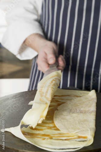 Photo: Folding a crêpe Folding a crêpe