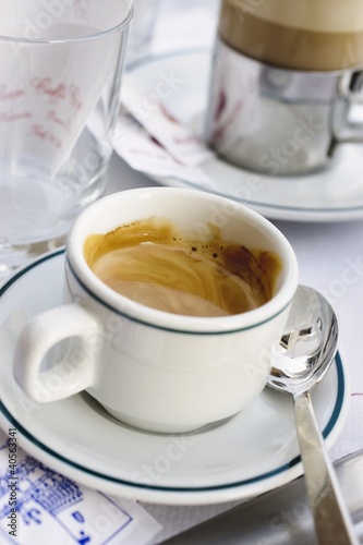 Photo: Cup of espresso in café in St. Mark's Square (Venice, Italy) Cup of espresso in café in St. Mark's Square (Venice, Italy)
