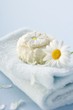 Marguerite soap and marguerite on towel