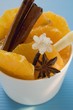 Orange slices with star anise, lemon grass & sugared flower