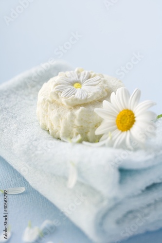 Photo: Marguerite soap and marguerite on towel Marguerite soap and marguerite on towel