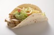 Photo: Folded tortilla filled with chicken, guacamole and cheese Folded tortilla filled with chicken, guacamole and cheese