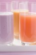 Blueberry milk and two different juices