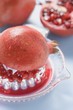 Squeezing a pomegranate