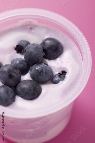 Photo: Blueberry yoghurt in plastic pot Blueberry yoghurt in plastic pot