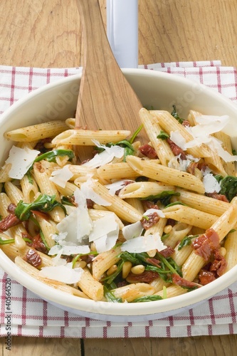 Photo: Penne with dried tomatoes, pine nuts and Parmesan Penne with dried tomatoes, pine nuts and Parmesan