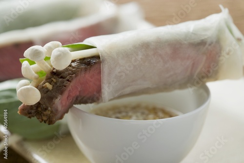 Photo: Rice paper rolls filled with beef & mushrooms, sesame sauce Rice paper rolls filled with beef & mushrooms, sesame sauce