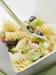 Photo: Fusilli with vegetables in take-away container (close-up) Fusilli with vegetables in take-away container (close-up)