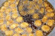 Deep-frying tofu in palm oil
