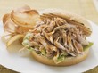 Spicy burger made with poultry meat, crisps