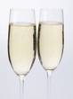 Two glasses of sparkling wine side by side