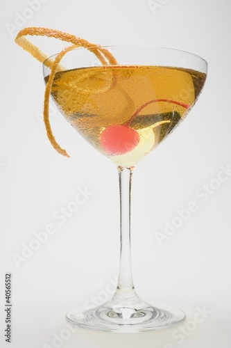 Photo: Manhattan with cocktail cherry and orange zest Manhattan with cocktail cherry and orange zest