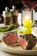 Grilled Fillet Cut in Half on a Plate; Rare