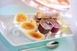 Coffee dessert with crème brûlée, fruit sauce and pastries