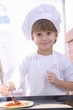 Foto: Girl making pizza Girl making pizza