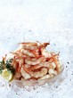 Cooked prawns in a bowl on crushed ice