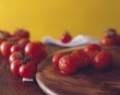 Fresh and skinned tomatoes