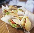 Smoked salmon, goat's cheese and tomato sandwiches