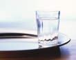 A glass of water on a tray