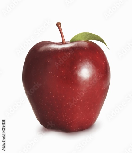 Photo: Red Delicious Apple with Leaf; White Background Red Delicious Apple with Leaf; White Background