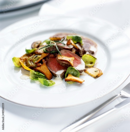 Photo: Venison fillet with sprout leaves and chanterelle mushrooms Venison fillet with sprout leaves and chanterelle mushrooms