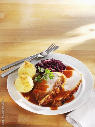 Photo: Roast pork with red cabbage and potato dumplings Roast pork with red cabbage and potato dumplings