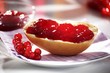 Redcurrant jam on bread roll