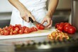 Chef chopping tomatoes