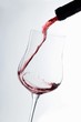 Pouring red wine