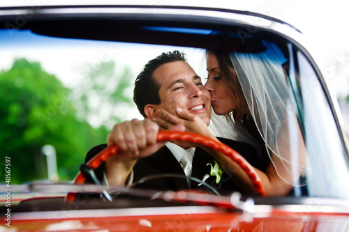 Photo: A bride kissing her groom A bride kissing her groom