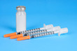syringes and a bottle