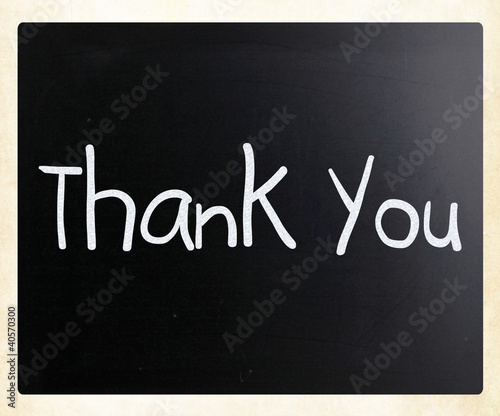 Illustration: "Thank you" handwritten with white chalk on a blackboard "Thank you" handwritten with white chalk on a blackboard
