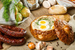 Sour soup served in bread with egg on Easter Sour soup served in bread with egg on Easter
