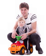 Photo: Joyful father and his baby son with car Joyful father and his baby son with car