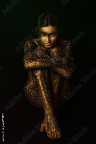 Photo: Brunette woman with body art Brunette woman with body art