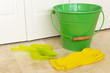 Green Bucket and Yellow Gloves