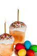 Easter cakes with candles and eggs on a white background Easter cakes with candles and eggs on a white background