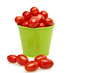Tomatoes in a green bucket Tomatoes in a green bucket