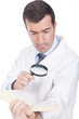 man holding a magnifying glass  and book