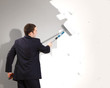 Young businesswoman with a paint brush Young businesswoman with a paint brush