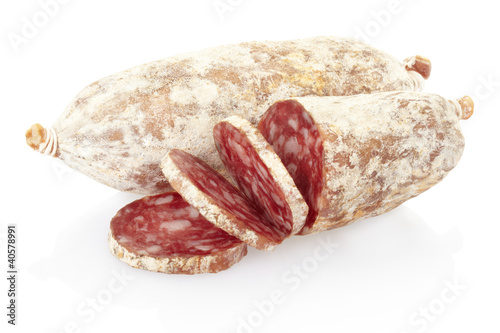 Photo: Sliced salami on white, clipping path included Sliced salami on white, clipping path included