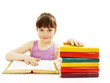 Beautiful girl with school books on the table